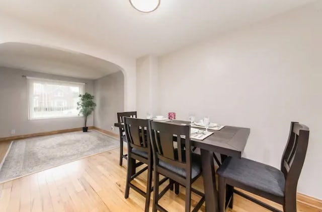 dining space featuring light hardwood / wood-style floors