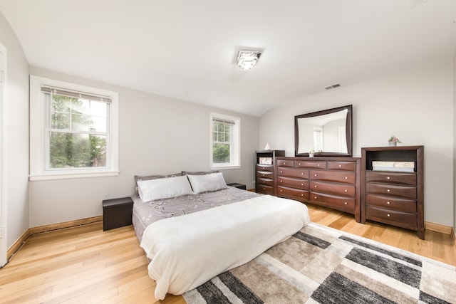 bedroom featuring light hardwood / wood-style floors