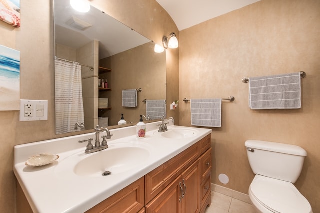 bathroom with toilet, tile patterned flooring, a shower with shower curtain, and vanity