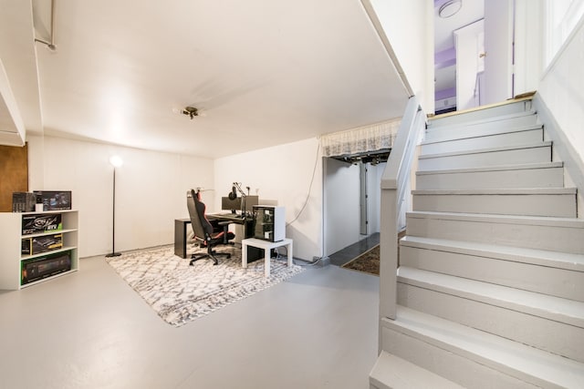 interior space featuring concrete flooring