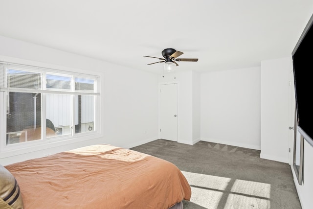 bedroom featuring ceiling fan and carpet flooring