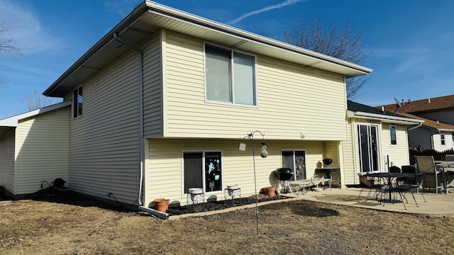 back of house with a patio area