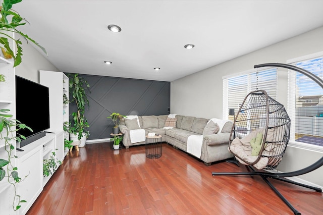 unfurnished living room featuring dark wood-type flooring