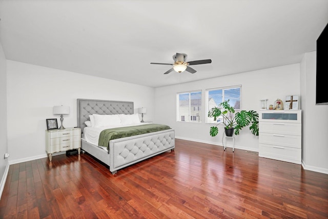 bedroom featuring dark wood-type flooring and ceiling fan