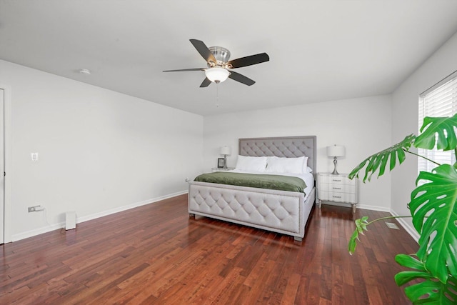 bedroom featuring dark hardwood / wood-style floors and ceiling fan