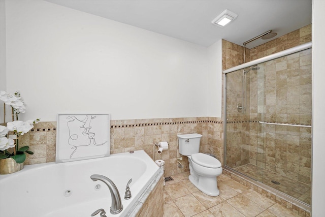 bathroom with shower with separate bathtub, tile walls, tile patterned floors, and toilet