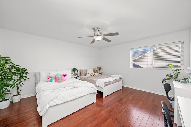 bedroom featuring dark hardwood / wood-style floors and ceiling fan