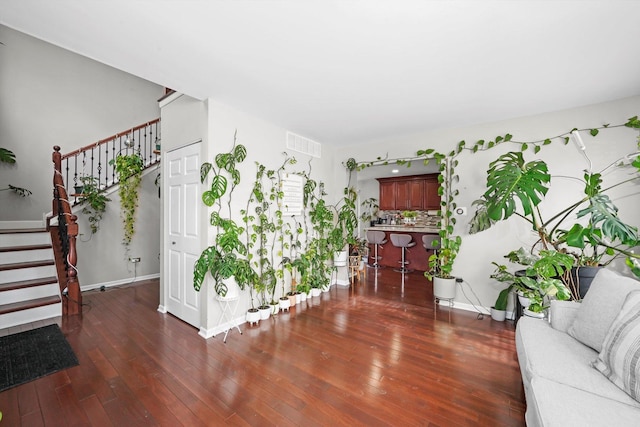 living room with dark wood-type flooring