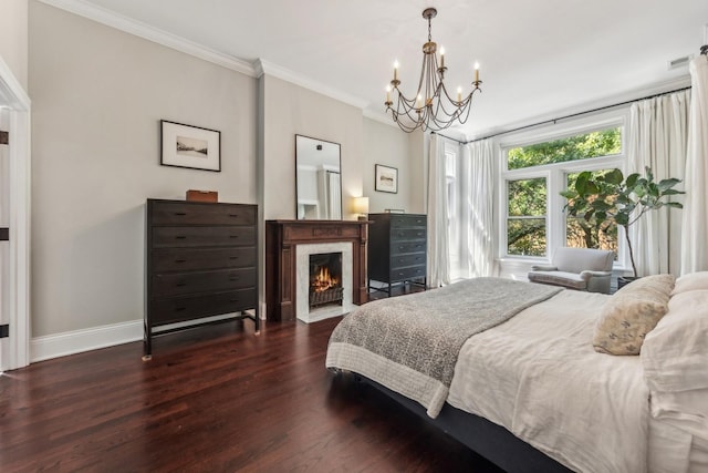 bedroom featuring crown molding, dark hardwood / wood-style flooring, and an inviting chandelier