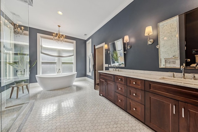 bathroom with an inviting chandelier, ornamental molding, vanity, and a bath