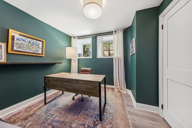 office area with hardwood / wood-style flooring