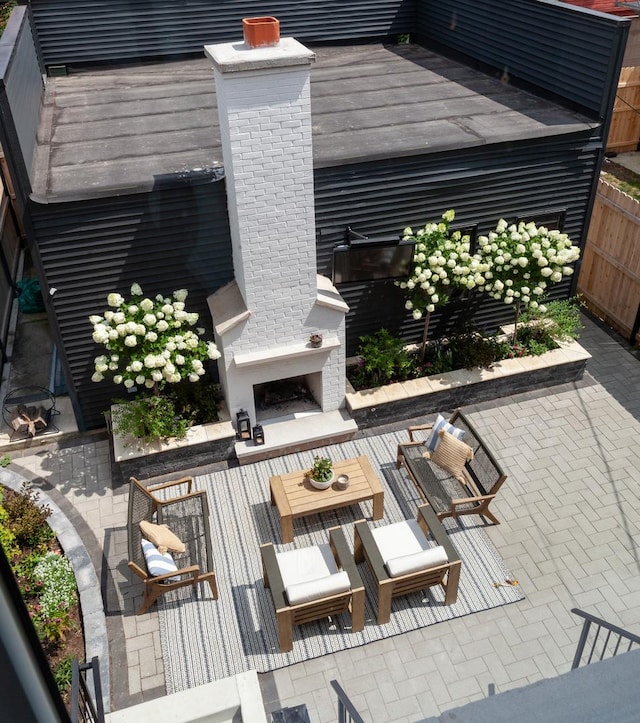 view of patio featuring an outdoor fireplace