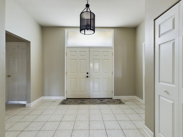 entrance foyer featuring light tile patterned floors