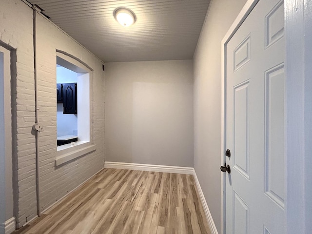 empty room with light hardwood / wood-style floors