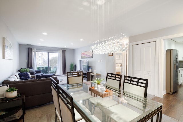 dining area with light hardwood / wood-style flooring