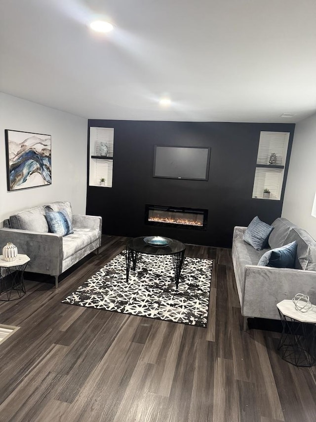 living room with dark hardwood / wood-style floors