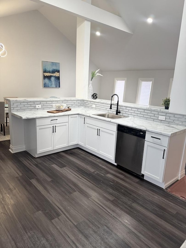 kitchen with white cabinetry, dishwasher, sink, light stone counters, and kitchen peninsula