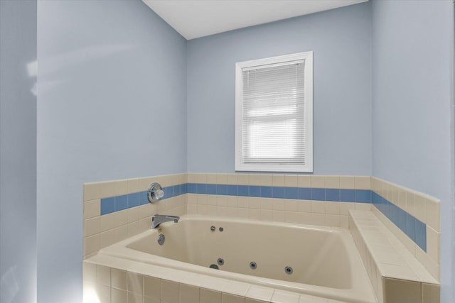 bathroom with tiled tub