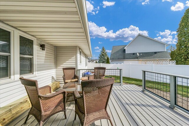 deck with an outdoor hangout area