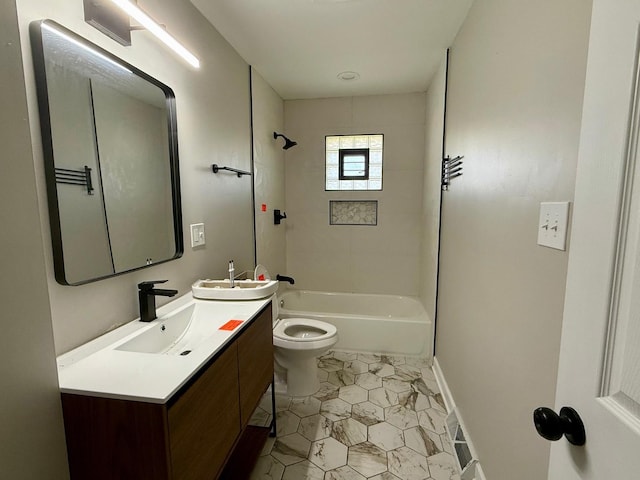 full bathroom featuring tiled shower / bath combo, vanity, tile patterned flooring, and toilet