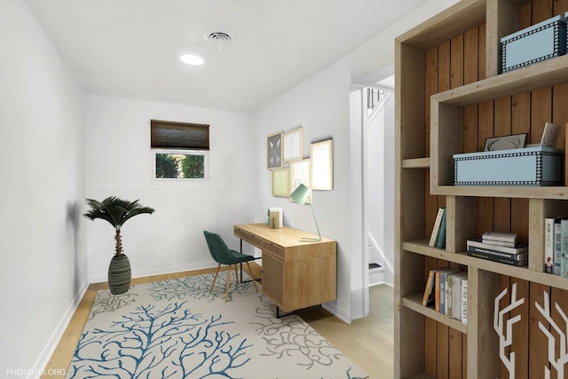 home office featuring light hardwood / wood-style floors