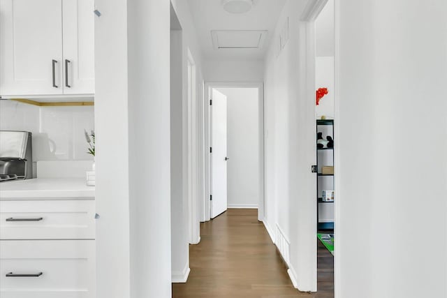 hall with dark hardwood / wood-style floors