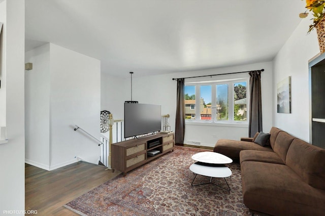 living room featuring dark hardwood / wood-style floors