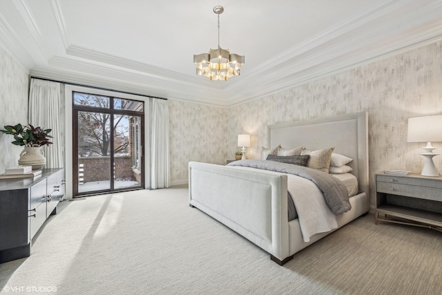 bedroom featuring crown molding, carpet floors, access to outside, a raised ceiling, and a chandelier