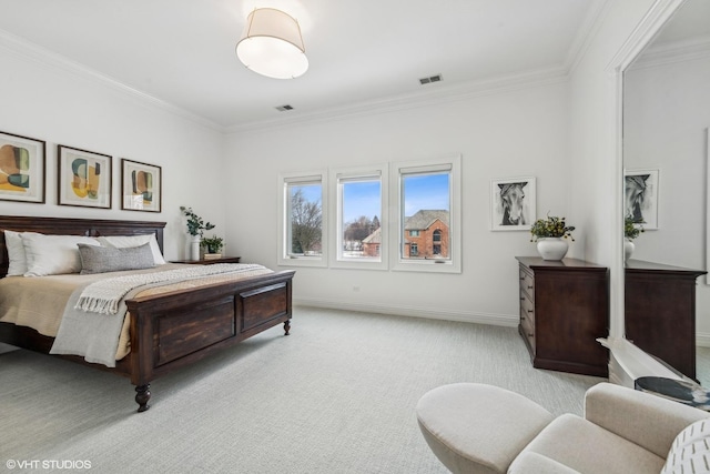 carpeted bedroom with crown molding