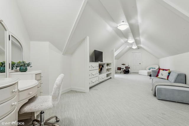 carpeted office space with lofted ceiling