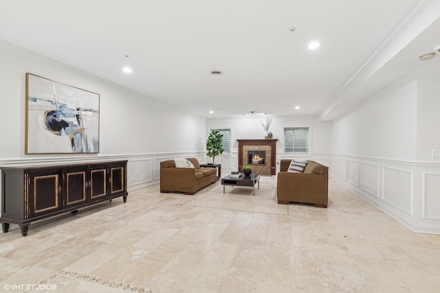 living room featuring crown molding