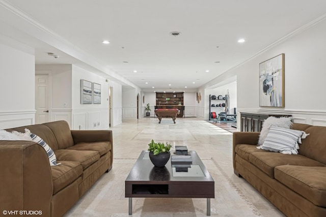 living room with crown molding and pool table