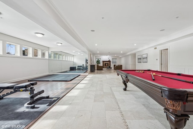 game room with crown molding and billiards