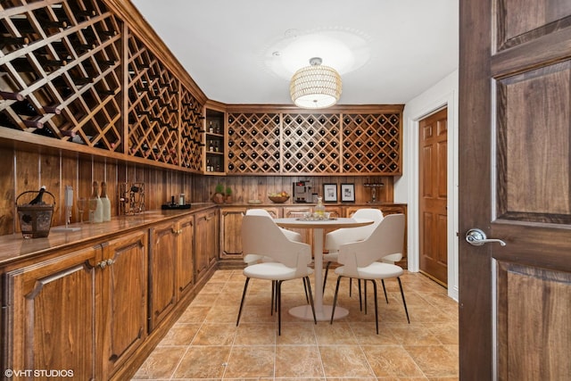 wine cellar with light tile patterned floors