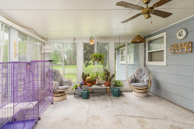 sunroom / solarium with ceiling fan