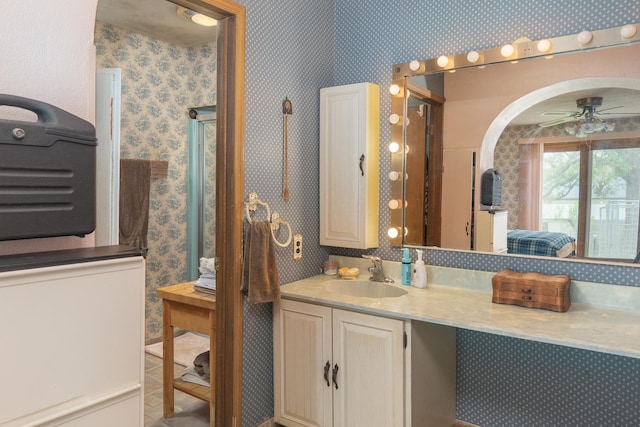 bathroom featuring vanity and ceiling fan