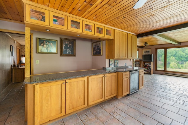 kitchen featuring wood ceiling, dark stone countertops, dishwasher, kitchen peninsula, and a baseboard heating unit