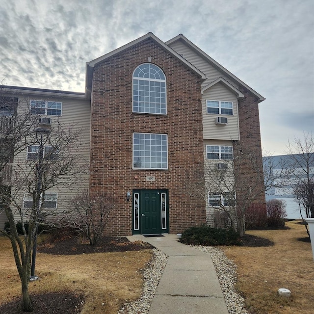 view of front of home with a front yard