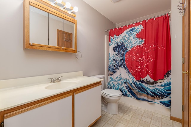 bathroom featuring tile patterned floors, vanity, curtained shower, and toilet