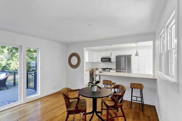 dining area featuring light hardwood / wood-style flooring