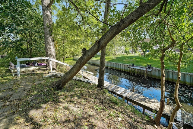 view of dock with a water view