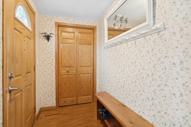 mudroom with light hardwood / wood-style floors