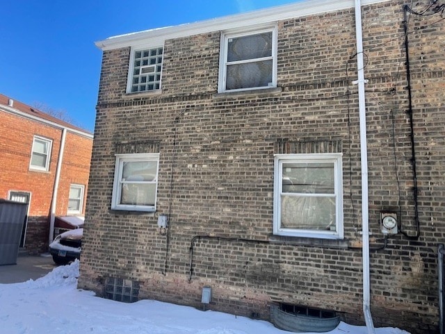 view of snow covered property