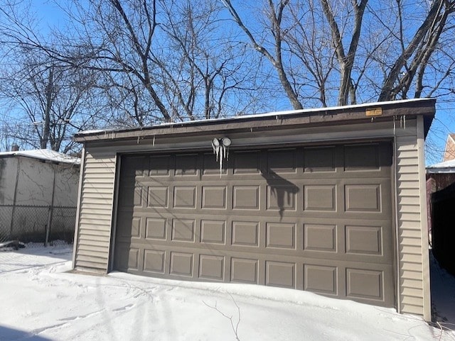 view of snow covered garage