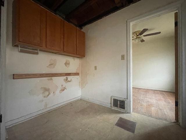 interior space featuring ceiling fan