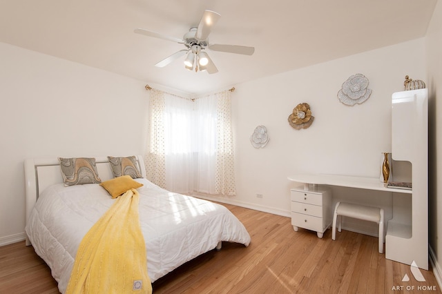 bedroom featuring ceiling fan and light wood-type flooring