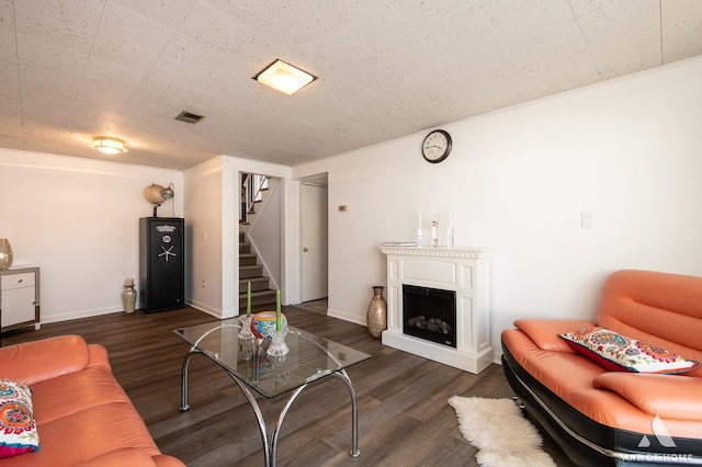 living room with dark hardwood / wood-style floors