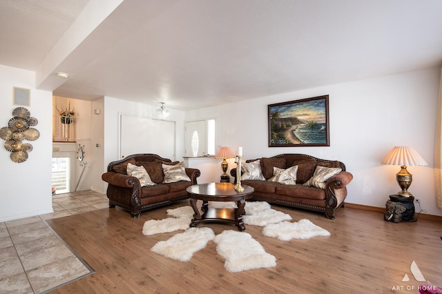 living room with light hardwood / wood-style floors