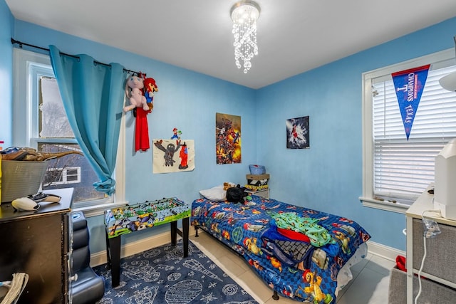 bedroom featuring tile patterned floors