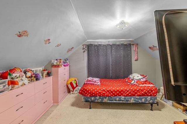 bedroom featuring vaulted ceiling